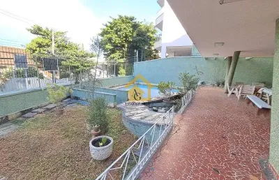 Casa à venda no jardim guanabara, rio de janeiro-rj: 5 quartos, piscina, churrasqueira e muito potencial de personalização!