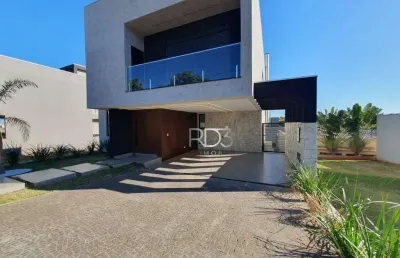 Sobrado com 3 dormitórios à venda, 200 m² por r$ 1.690.000,00 - parque tauá - cond. araçari - londrina/pr