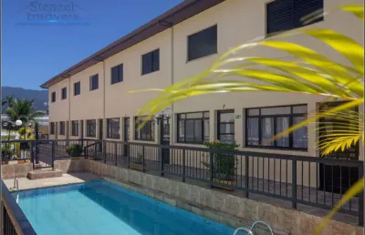 Casa em village com 2 quartos, 85m² por r$ 550.000 - centro - bertioga/sp