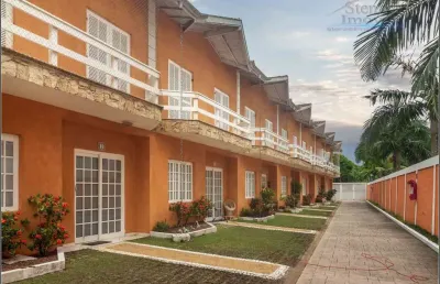 Casa em village com 3 quartos, 117m² por r$ 690.000 - centro - bertioga/sp