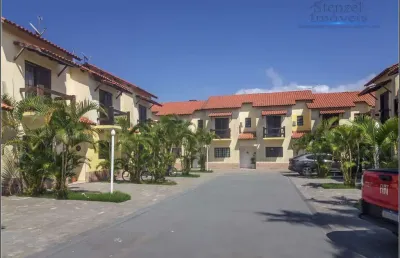 Casa em village com 2 quartos, 78m² por r$ 450.000 - indaiá - bertioga/sp