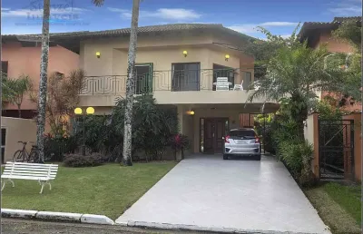 Casa frente ao mar com 4 suítes, 594m² por r$ 3.000.000 - bougainville - bertioga/sp