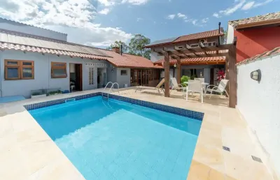 Casa em condomínio fechado com 3 quartos à venda na avenida juca batista, --, cavalhada, porto alegre por r$ 1.600.000