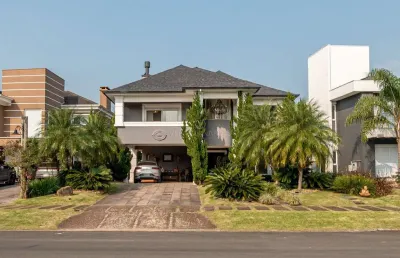 Casa em condomínio fechado com 3 quartos à venda na avenida juca batista, --, belém novo, porto alegre por r$ 4.190.000