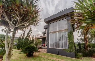 Casa em condomínio fechado com 4 quartos à venda na rua bertha loforte gonçalves, --, vila nova, porto alegre por r$ 3.500.000