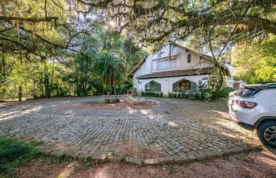 Casa com 4 quartos à venda na avenida coronel marcos, --, pedra redonda, porto alegre por r$ 2.400.000