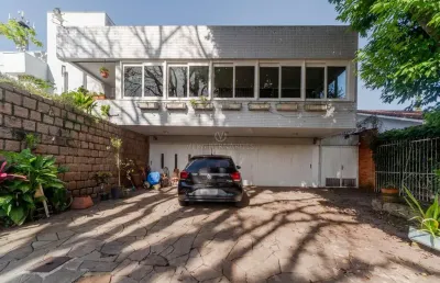 Casa com 3 quartos à venda na rua maracá, --, vila assunção, porto alegre por r$ 3.000.000