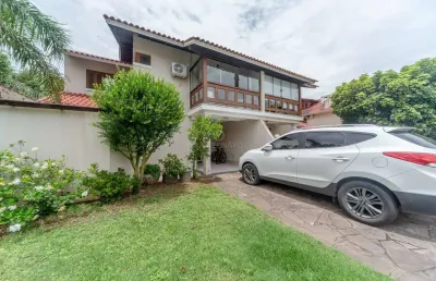 Casa em condomínio fechado com 3 quartos à venda na avenida eduardo prado, --, cavalhada, porto alegre por r$ 1.200.000