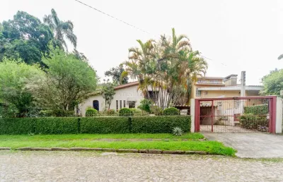 Casa com 3 quartos à venda na rua cariri, --, vila assunção, porto alegre por r$ 1.495.000