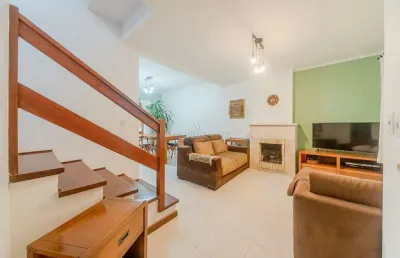 Casa em condomínio fechado com 3 quartos à venda na avenida eduardo prado, --, cavalhada, porto alegre por r$ 950.000