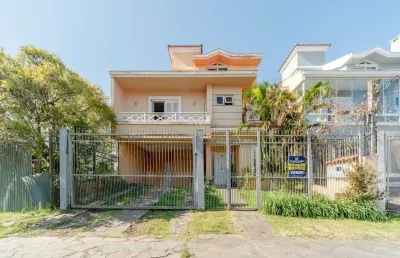 Casa com 3 quartos à venda na rua rincão, --, ipanema, porto alegre por r$ 695.000