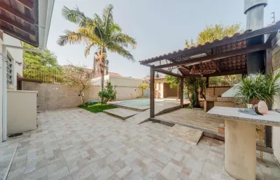 Casa com 3 quartos à venda na avenida guaíba, --, serraria, porto alegre por r$ 1.370.000