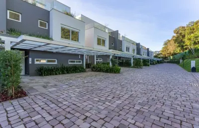 Casa em condomínio fechado com 3 quartos à venda na rua doutor ney de castilhos ferreira, --, pedra redonda, porto alegre por r$ 2.750.000