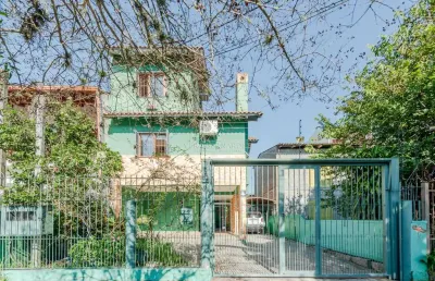 Casa com 3 quartos à venda na rua afonso arinos, --, camaquã, porto alegre por r$ 890.000