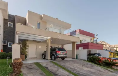 Casa em condomínio fechado com 3 quartos à venda na avenida edgar pires de castro, --, aberta dos morros, porto alegre por r$ 1.250.000