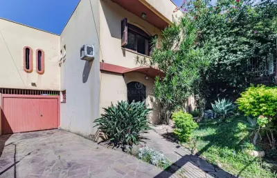 Casa com 3 quartos à venda na avenida capivari, --, cristal, porto alegre por r$ 1.050.000