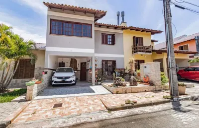 Casa em condomínio fechado com 3 quartos à venda na rua ponciano pacheco da silveira, --, guarujá, porto alegre por r$ 510.000
