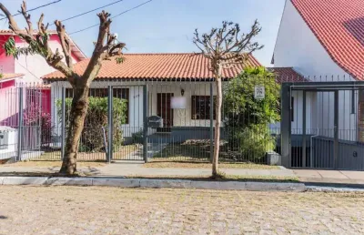 Casa com 4 quartos à venda na rua alcebíades antônio dos santos, --, nonoai, porto alegre por r$ 980.000