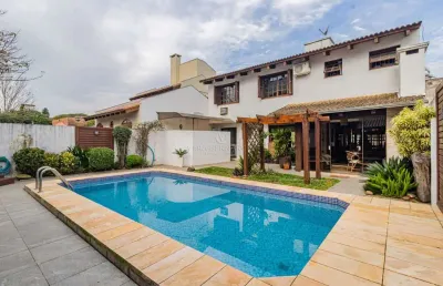 Casa com 4 quartos à venda na rua engenheiro coelho parreira, --, ipanema, porto alegre por r$ 1.272.000