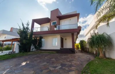 Casa em condomínio fechado com 3 quartos à venda na avenida edgar pires de castro, --, aberta dos morros, porto alegre por r$ 990.000