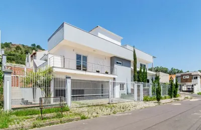 Casa com 4 quartos à venda na rua irmão jaime biazus, --, guarujá, porto alegre por r$ 1.500.000