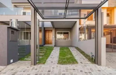 Casa com 3 quartos à venda na rua itacyr rossi, --, guarujá, porto alegre por r$ 560.000