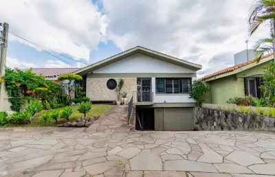 Casa com 4 quartos à venda na rua cariri, --, vila assunção, porto alegre por r$ 1.380.000
