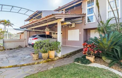 Casa com 3 quartos à venda na rua fortunato della casa, --, espírito santo, porto alegre por r$ 959.000