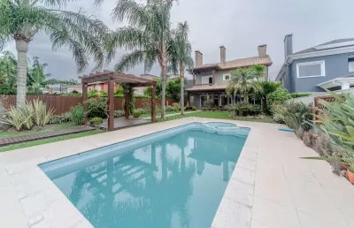 Casa em condomínio fechado com 4 quartos à venda na avenida juca batista, --, belém novo, porto alegre por r$ 2.400.000