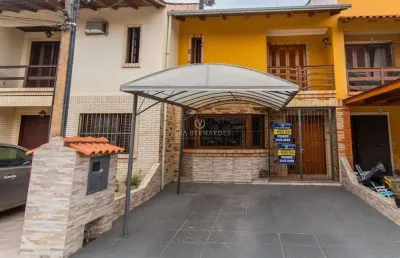 Casa em condomínio fechado com 2 quartos à venda na avenida edgar pires de castro, --, hípica, porto alegre por r$ 370.000