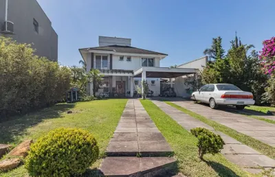 Casa em condomínio fechado com 3 quartos à venda na avenida juca batista, --, belém novo, porto alegre por r$ 2.150.000