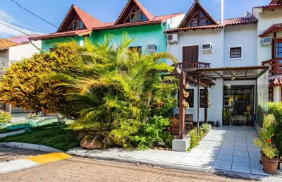 Casa em condomínio fechado com 3 quartos à venda na rua osório mendes ouriques, --, guarujá, porto alegre por r$ 450.000