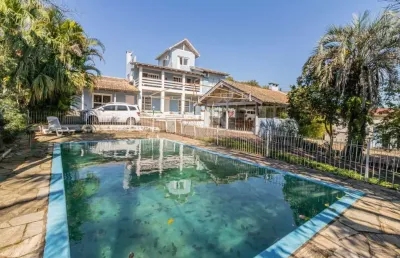 Casa com 6 quartos à venda na rua marquês do maricá, --, vila nova, porto alegre por r$ 1.300.000