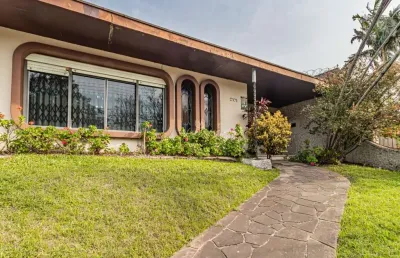Casa com 4 quartos à venda na rua jacipuia, --, guarujá, porto alegre por r$ 1.450.000