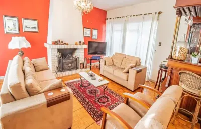 Casa com 4 quartos à venda na avenida pinheiro borda, --, cristal, porto alegre por r$ 1.150.000