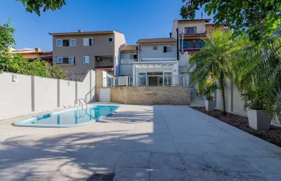 Casa com 4 quartos à venda na rua lloyd de andrade polidoro, --, ipanema, porto alegre por r$ 1.250.000