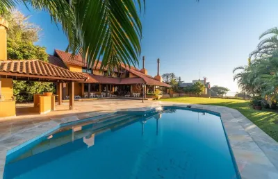 Casa com 4 quartos à venda na rua coroados, --, vila assunção, porto alegre por r$ 3.600.000