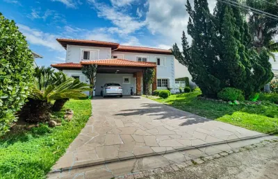 Casa em condomínio fechado com 3 quartos à venda na avenida juca batista, --, belém novo, porto alegre por r$ 2.980.000