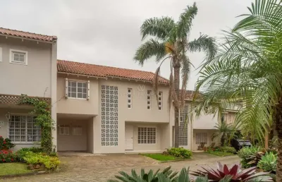 Casa em condomínio fechado com 4 quartos à venda na rua conrado ferrari, --, jardim isabel, porto alegre por r$ 890.000