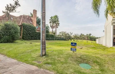 Terreno em condomínio fechado à venda na avenida juca batista, --, belém novo, porto alegre por r$ 690.000
