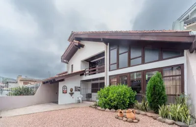 Casa em condomínio fechado com 3 quartos à venda na rua jacipuia, --, guarujá, porto alegre por r$ 970.000