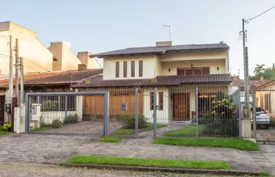 Casa com 5 quartos à venda na avenida pereira passos, --, vila assunção, porto alegre por r$ 2.320.000