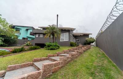 Casa com 4 quartos à venda na rua amapá, --, vila nova, porto alegre por r$ 1.650.000