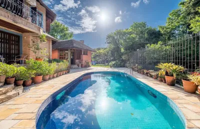 Casa em condomínio fechado com 5 quartos à venda na rua professor carlos de paula couto, --, cavalhada, porto alegre por r$ 6.000.000
