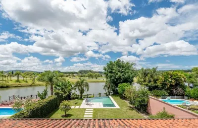 Casa em condomínio fechado com 4 quartos à venda na avenida juca batista, --, belém novo, porto alegre por r$ 2.450.000