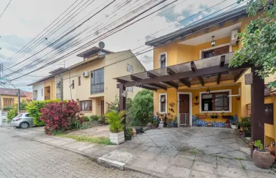 Casa em condomínio fechado com 2 quartos à venda na avenida edgar pires de castro, --, hípica, porto alegre por r$ 600.000