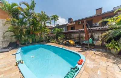 Casa com 4 quartos à venda na rua adão pinheiro da silva, --, ipanema, porto alegre por r$ 990.000