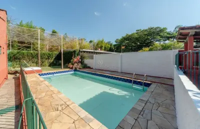 Casa com 4 quartos à venda na rua gávea, --, ipanema, porto alegre por r$ 1.200.000