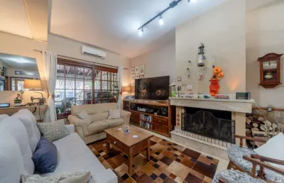 Casa com 3 quartos à venda na rua doutor pio ângelo, --, ipanema, porto alegre por r$ 950.000