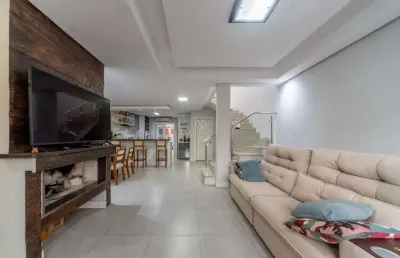 Casa com 3 quartos à venda na rua aldo sani, --, hípica, porto alegre por r$ 700.000